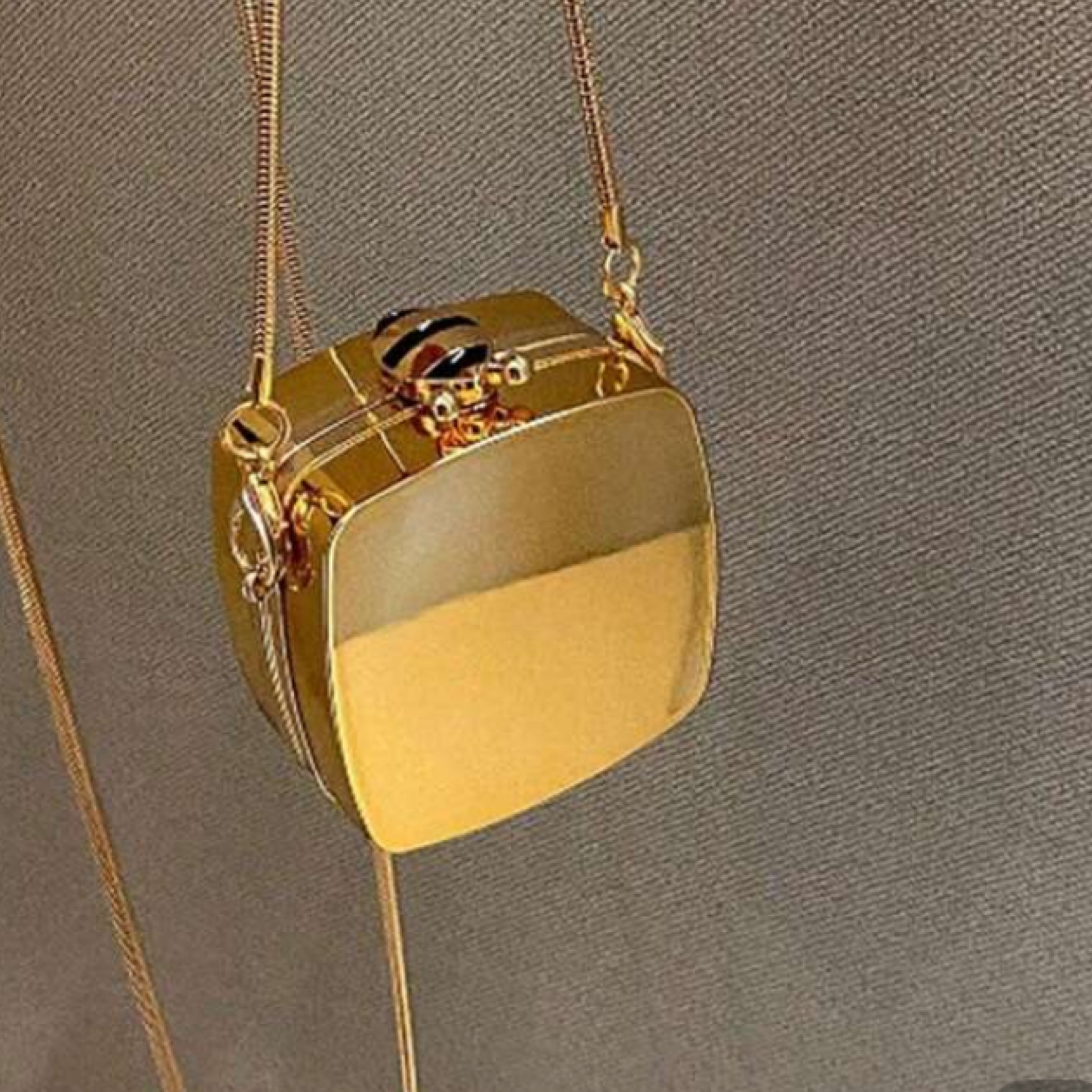 Gold cross body